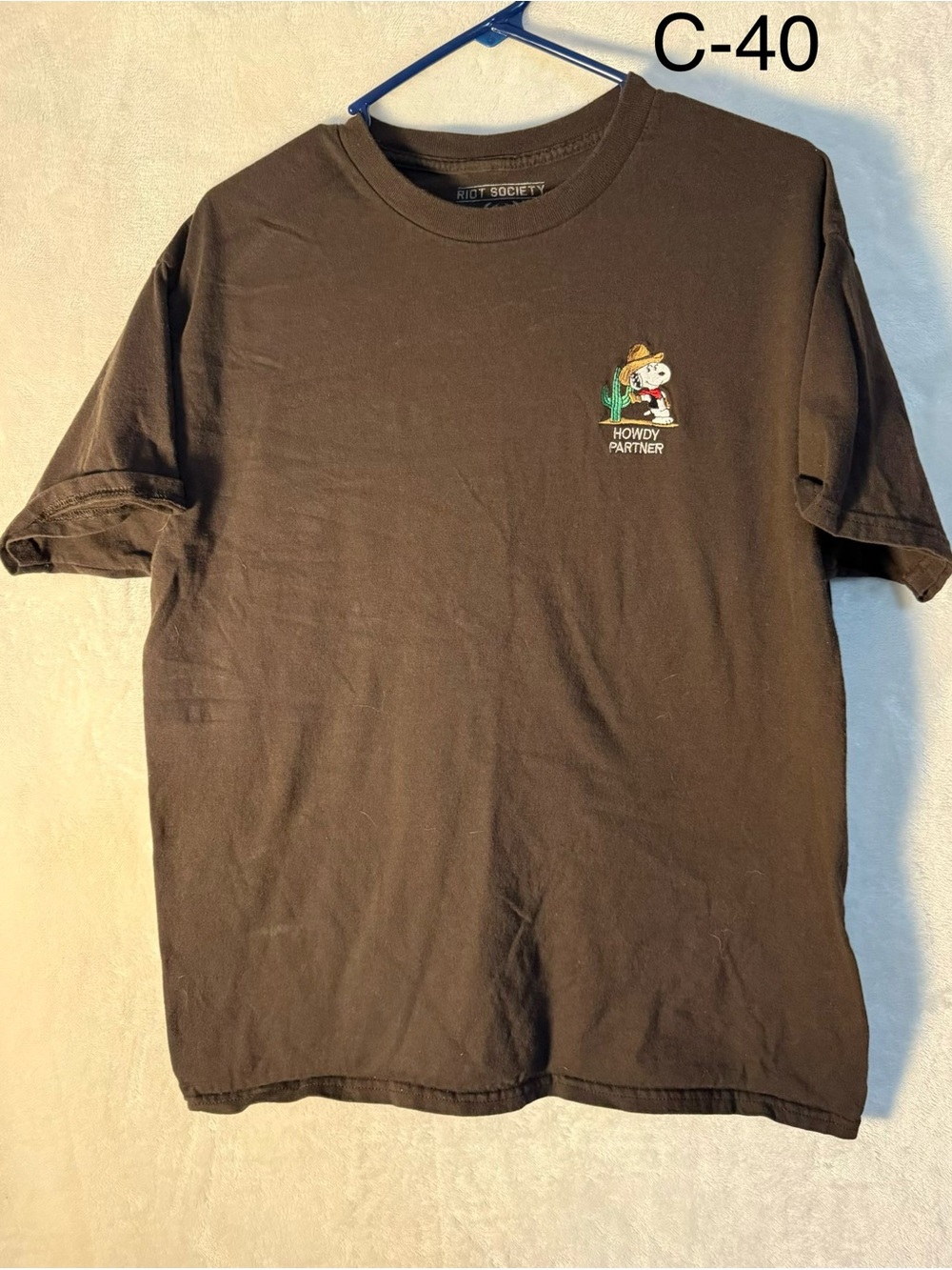 riot society brown short sleeve tee with 'Howdy Partner' chest graphic